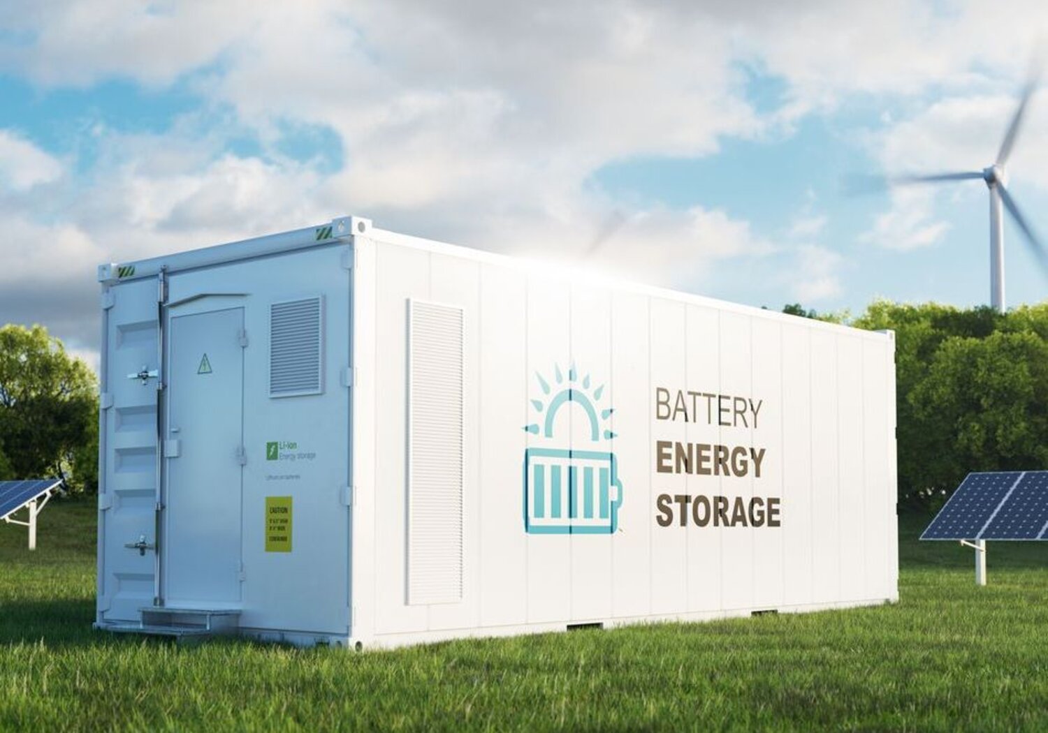 Image showing  a modern high-capacity battery energy storage systemIn a green field with solar panels in the background sits a large white container with the words “Batter energy storage” written on the side.
