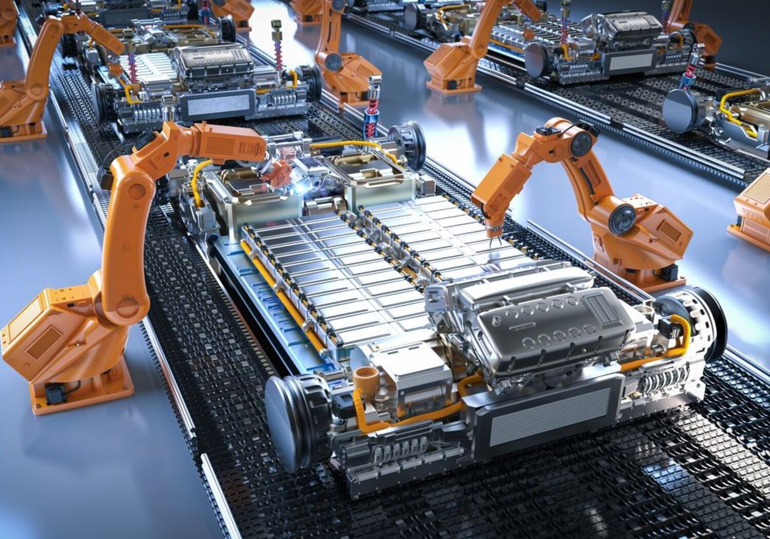 Image showing an electric car battery assembly line. In a sterile room a row of orange robotic arms are manufacturing electric car batteries on an assembly line.