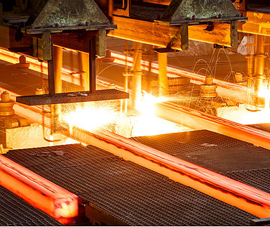 Image showing hot steel on conveyor in steel mill