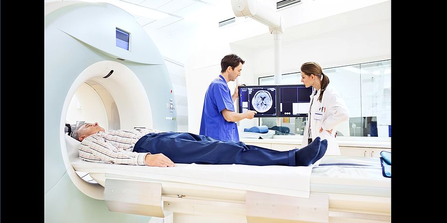 Image showing Two doctors discussing a CAT scan
