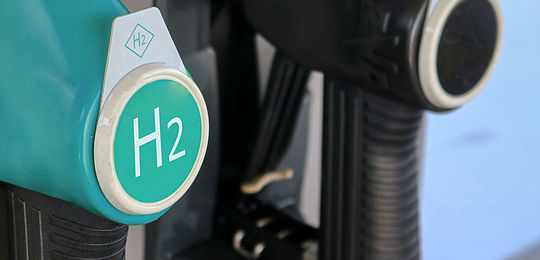Close up of hydrogen logo on gas stations fuel dispenser