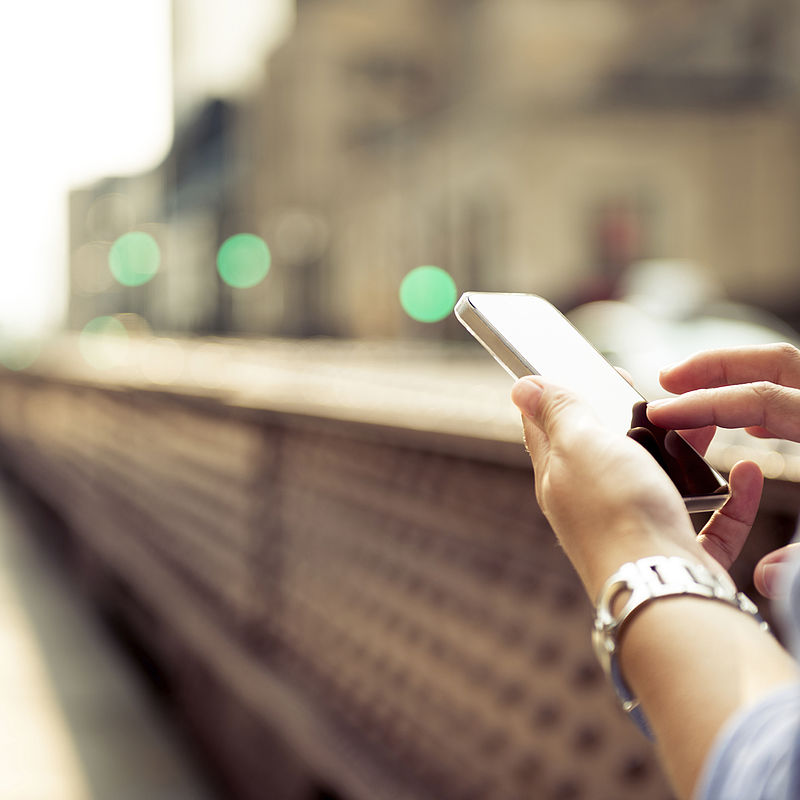 Building capability in the field of radio frequency and microwave measurements Image showing a person using a smart phone