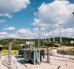 Image showing renewable green energy - power substation and wind turbines