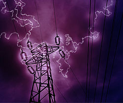 image showing Lightning hitting a high voltage tower
