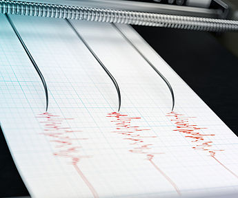 Image of a seismograph showing earthquake activity