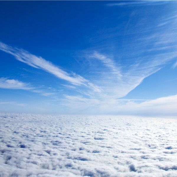Image showing the view of clouds through the potral of a plane