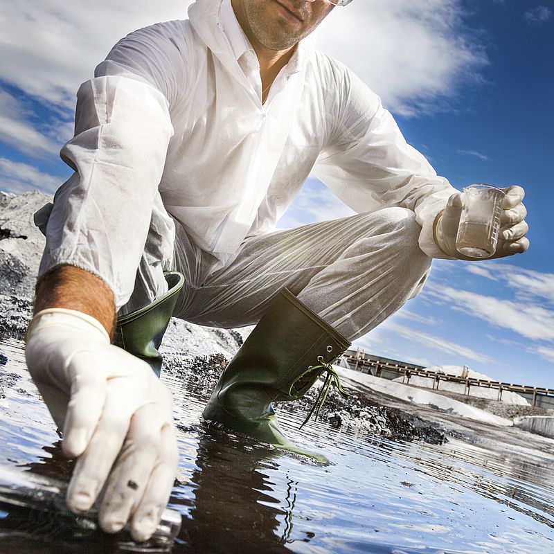Image showing Scientist analysing the water of a river