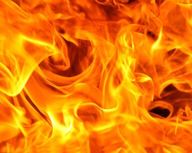 Close up of red and yellow swirling flames 