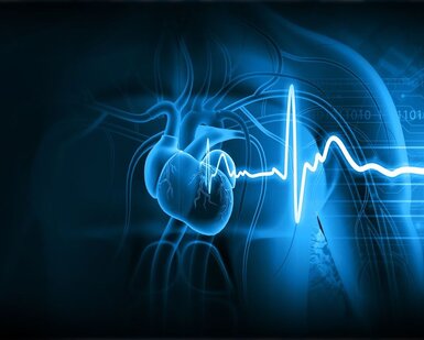 Image showing an artist’s impression of a beating heart. Against a dark background a heart beats inside a human body giving off a pulse of electricity.