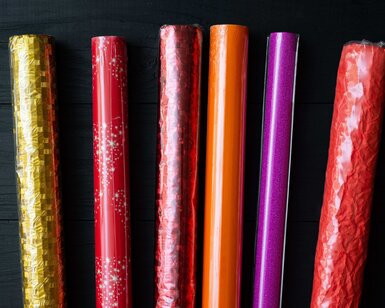 Image showing assorted rolls of wrapping paper in different colours with different visual effects