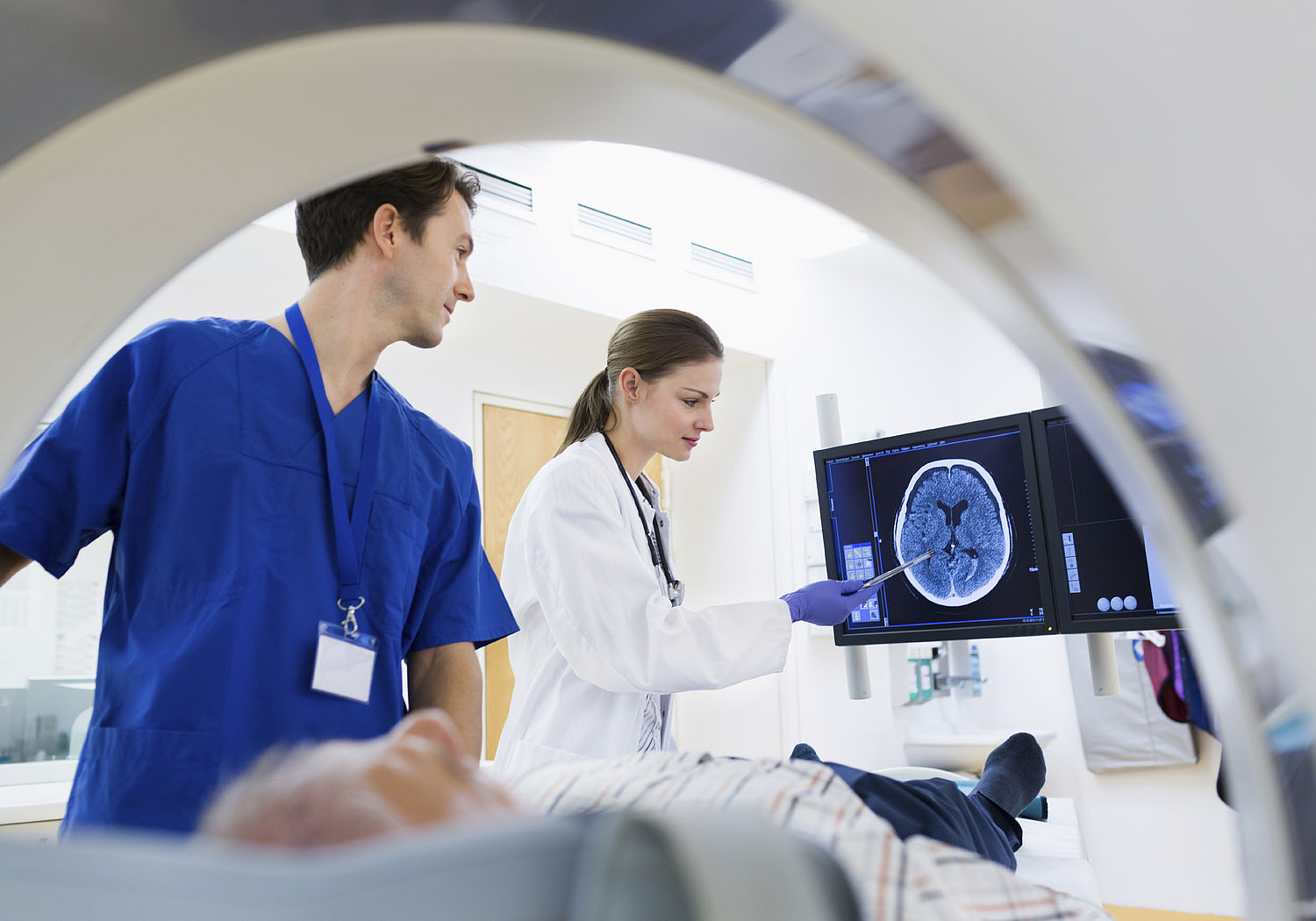 Image showing doctors performing a scan on a patient