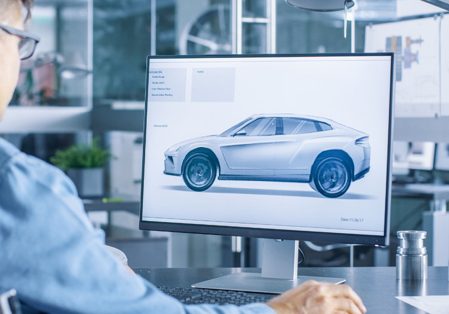 Image of an automotive engineer designing a car