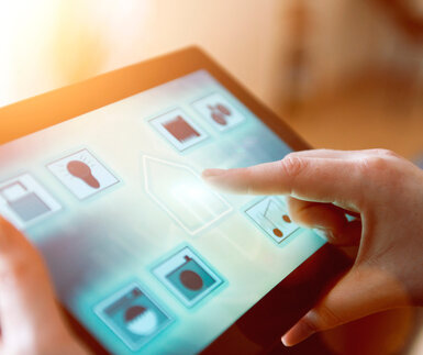 Image showing a smart home control app on a tablet