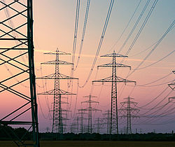 Image shows a high voltage transmission tower