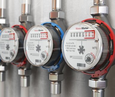 Image showing row of water meters of cold and hot water