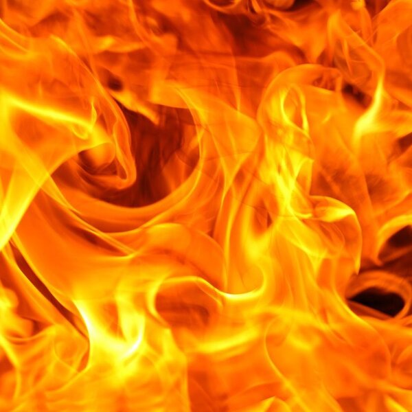 Close up of red and yellow swirling flames 