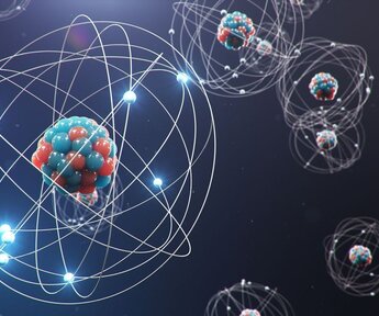 Against a dark background are an artist’s illustration of atomic structures with an atom with a large number of neutrons and protons in the foreground with other atoms in the distance