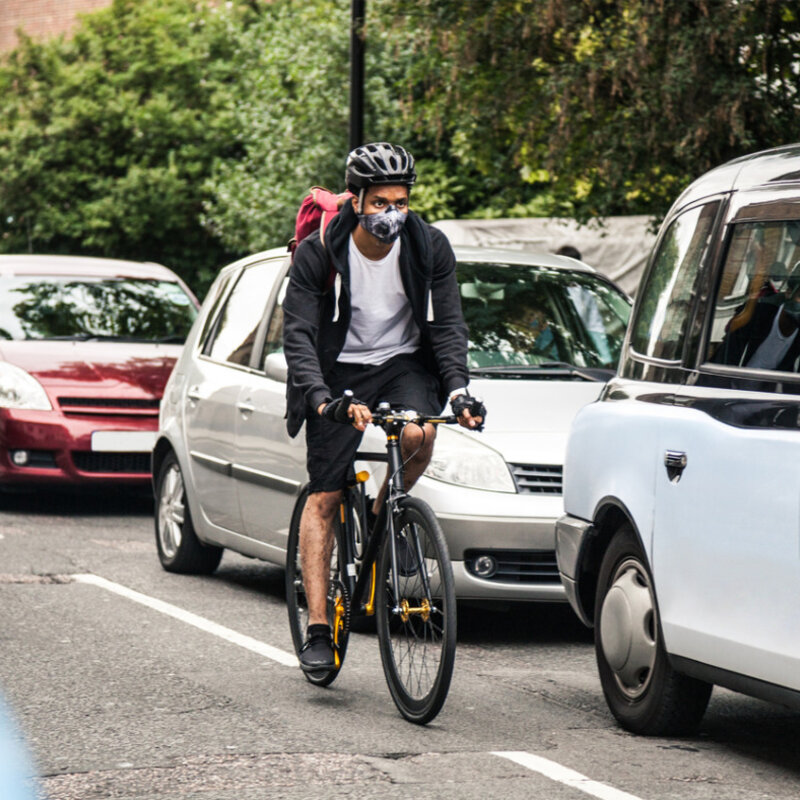 Developing metrology to improve air quality monitoring Cyclist commuter wearing a pollution mask