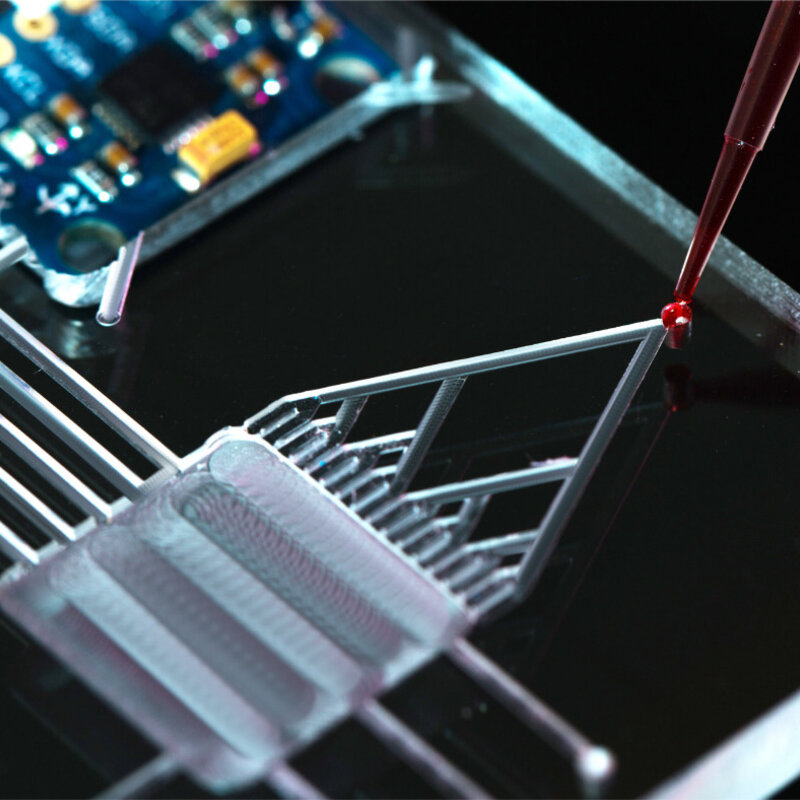 Developing new standards for microfluidic devices in medical and pharmaceutical applications Image showing a close up of a lab-on-a-chip