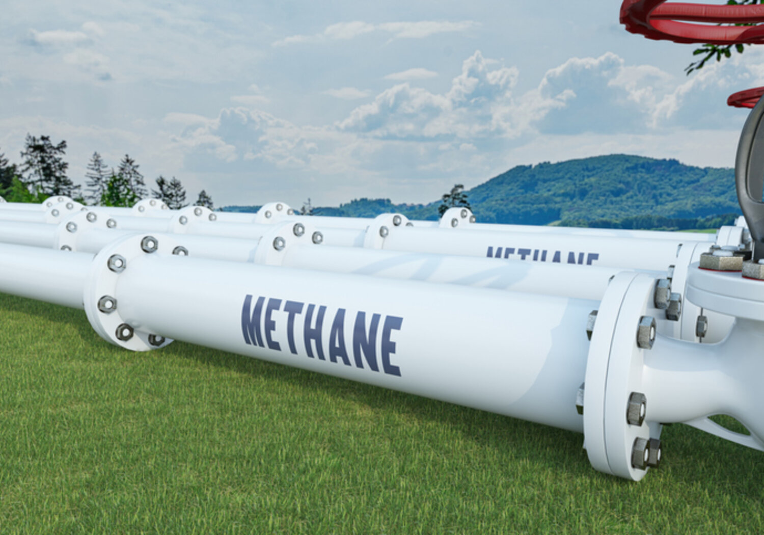 Image showing a large white pipeline running through a field with the words "METHANE" written on in capital letters.