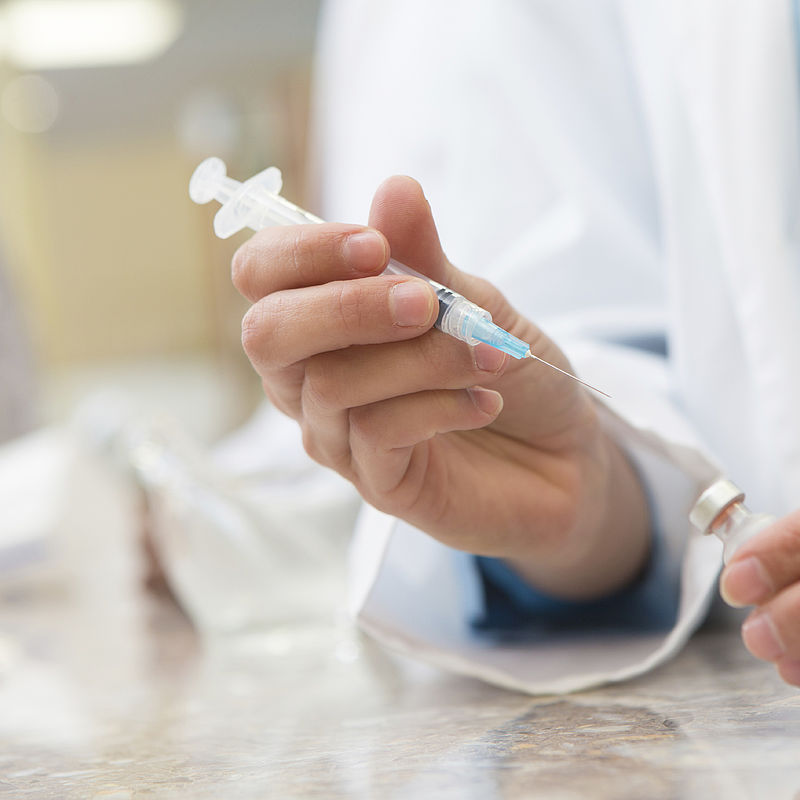 Calibration and validation of MRT Image showing custom prescription drugs being created in pharmacy