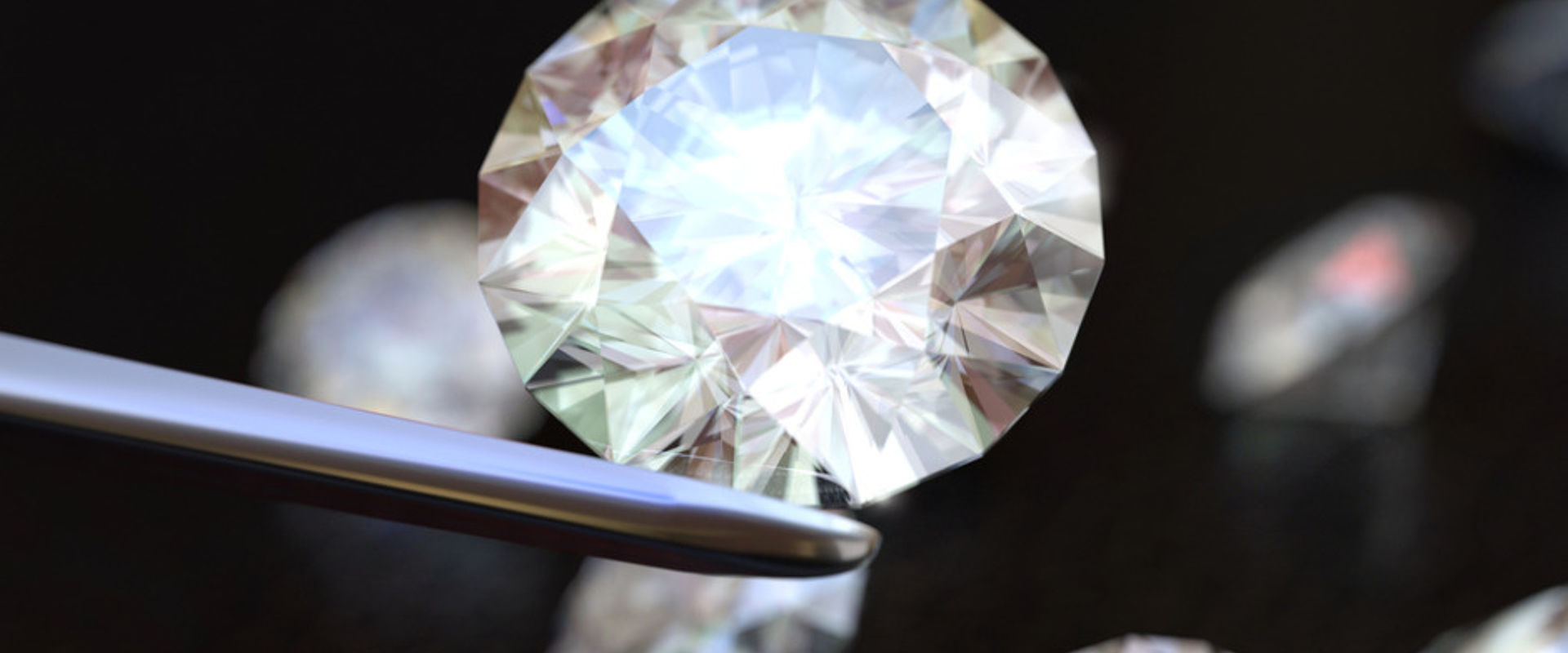 Jewelry tweezer and diamonds picture id478775690