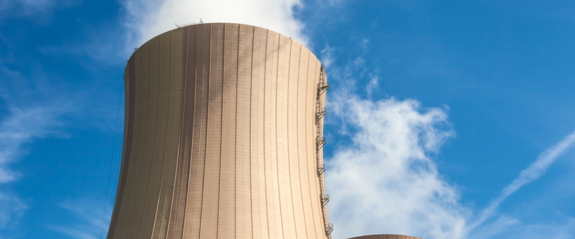 Nuclear power station close up of the chimneys picture id511486902