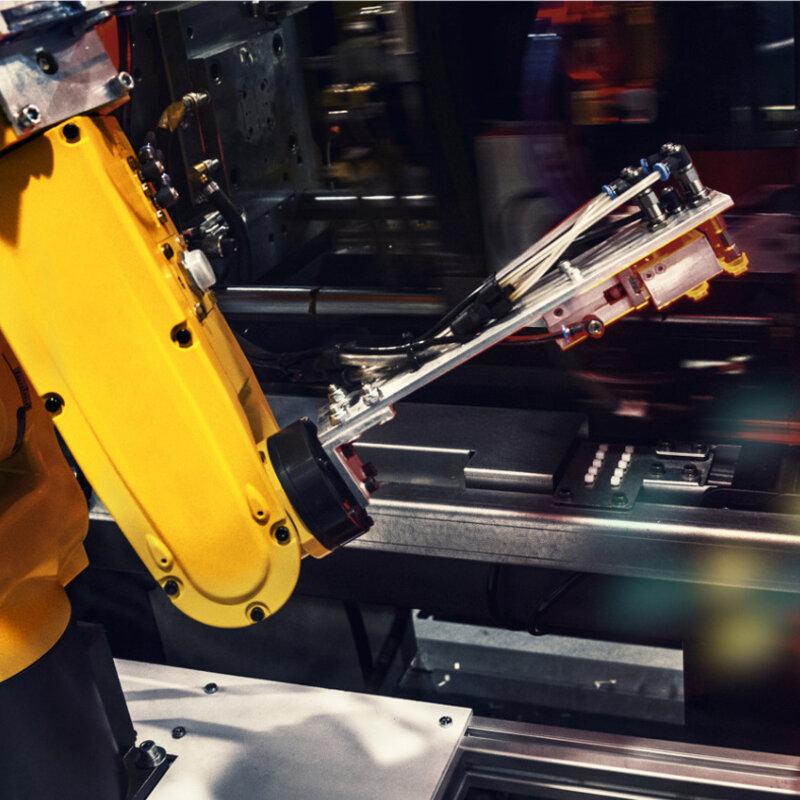 Developing the instruments for advanced manufacturing and the factories of the future Image of a industrial robotic arm in a factory