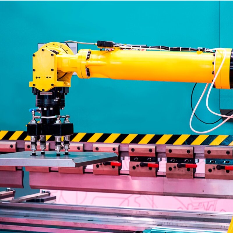 Large volume metrology solutions for industry Image showing a robotic arm in a production line