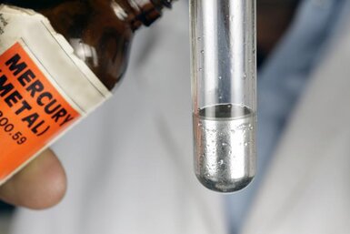 Image showing mercury metal being poured into a test tube