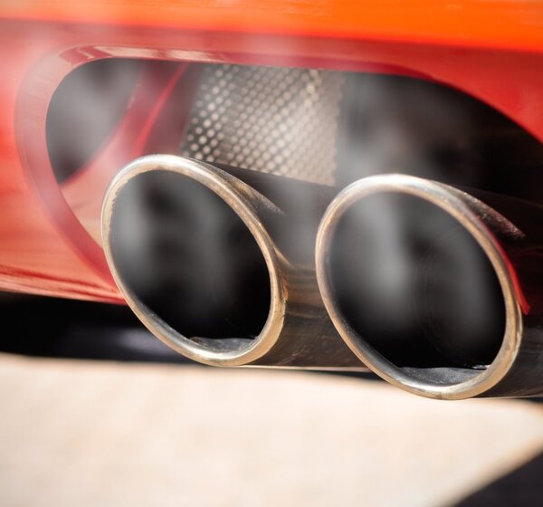 Image showing a Car dual exhaust pipe with smoke 