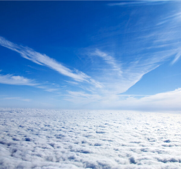 Image showing the view of clouds through the potral of a plane