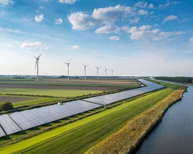 Image showing solar panels and wind turbines generating renewable energy for green and sustainable future