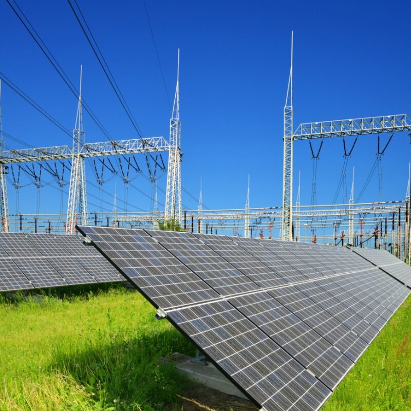 Developing a reference SAMU to aid the modernisation of the power grid Solar energy panels in the background high voltage power substation