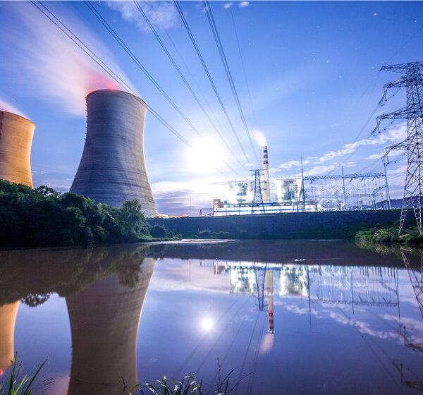 Image showing a power plant on the banks of a river